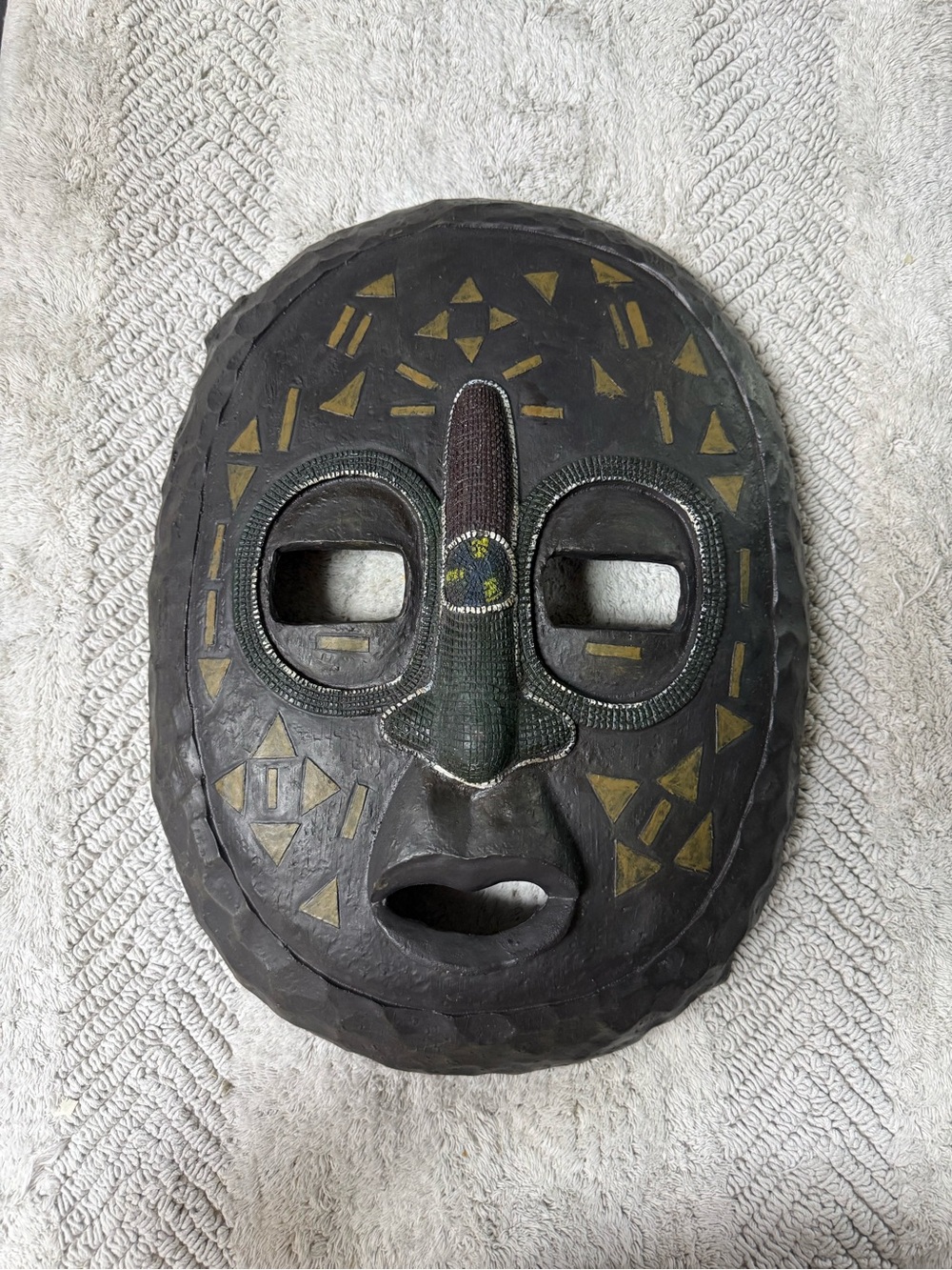Handcrafted Tribal Decorative Mask in Black and Gold